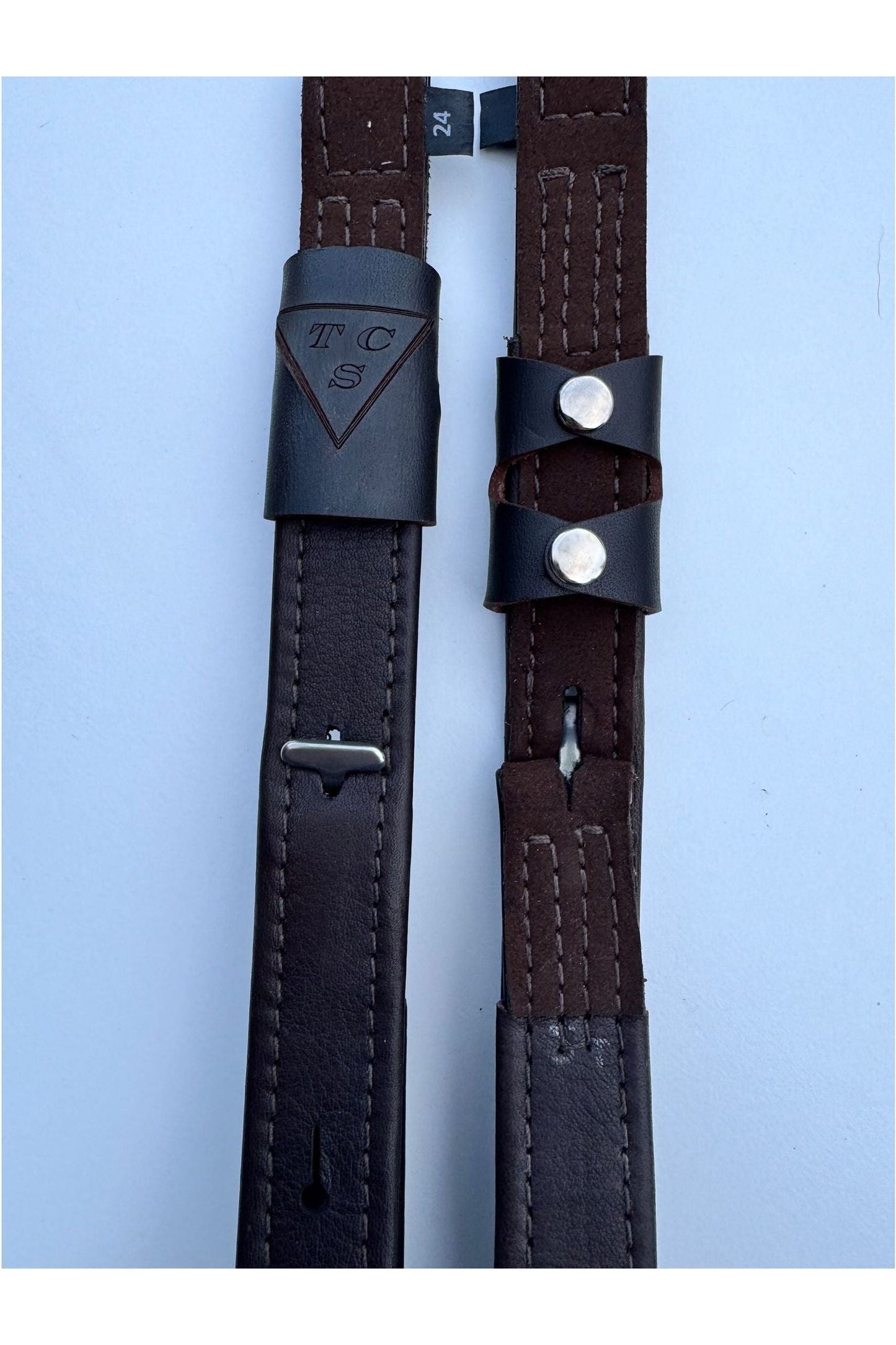 A picture of the TCS stirrup leathers with the toggles pulled up, revealing the T-bar attachement