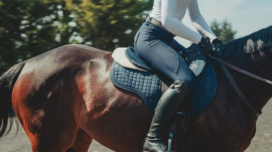 Balanced rider demonstrating rider biomechanics and close contact in a Total Contact Saddle