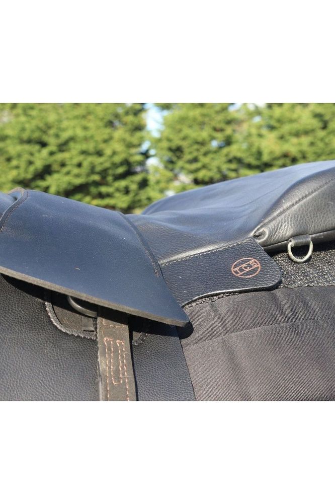 A black classic total contact treeless saddle and a black total contact saddle seat pad