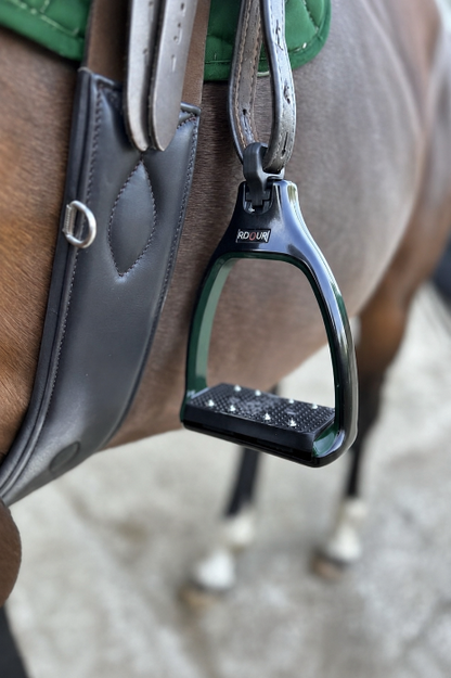 A close up of safety stirrups with a 90 degree eye which reduces bulk under the rider's leg