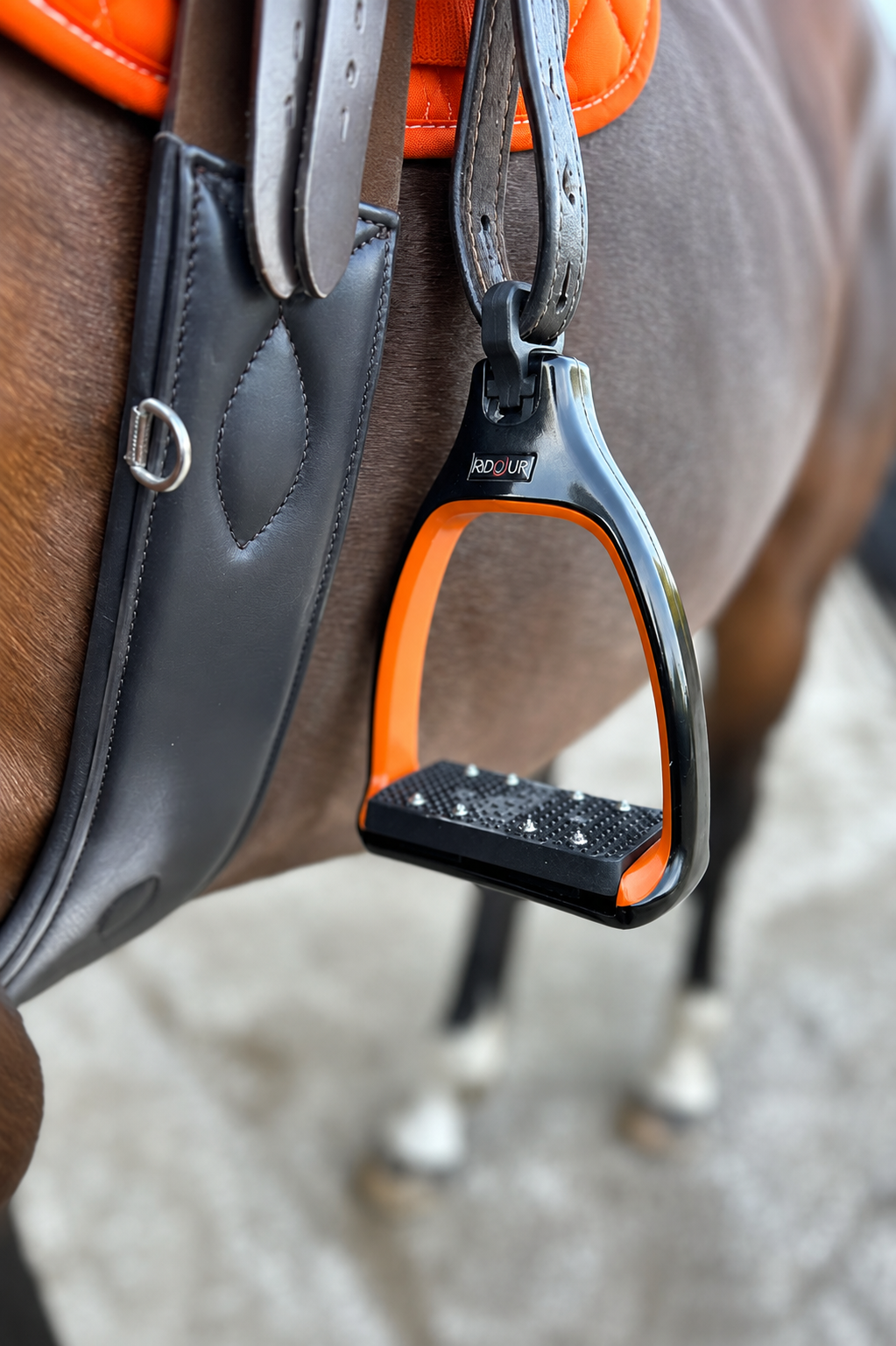A close up of safety stirrups with a 90 degree eye which reduces bulk under the rider's leg