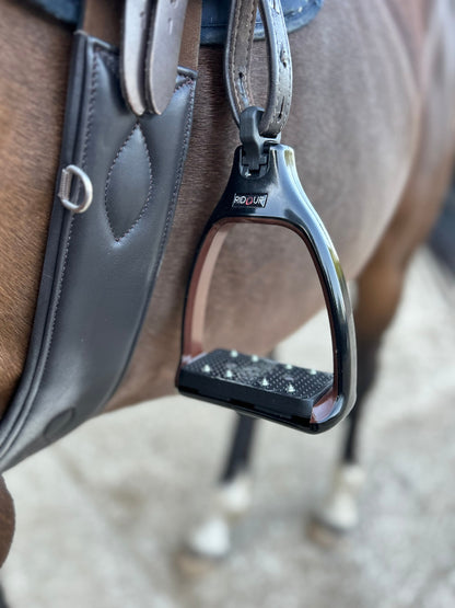 A close up of safety stirrups with a 90 degree eye which reduces bulk under the rider's leg